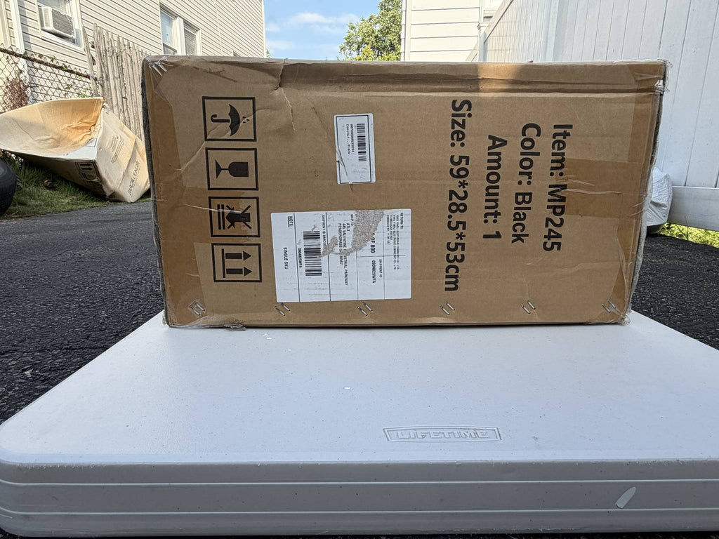 CoolHut MP245 labeled carton side showing dents, handling symbols, and shipping labels