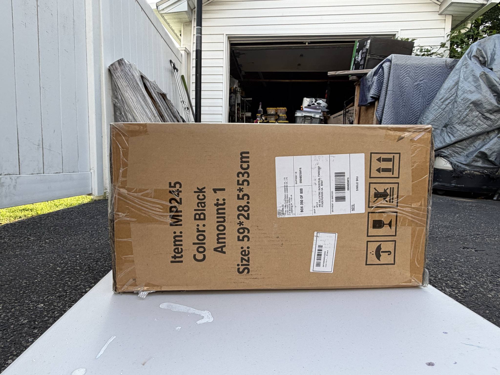 CoolHut MP245 labeled carton side showing staples, creases, and edge wear