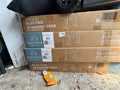 Four Electric Standing Desk cartons, model ELT-P4024V3-WT, showing warehouse handling wear