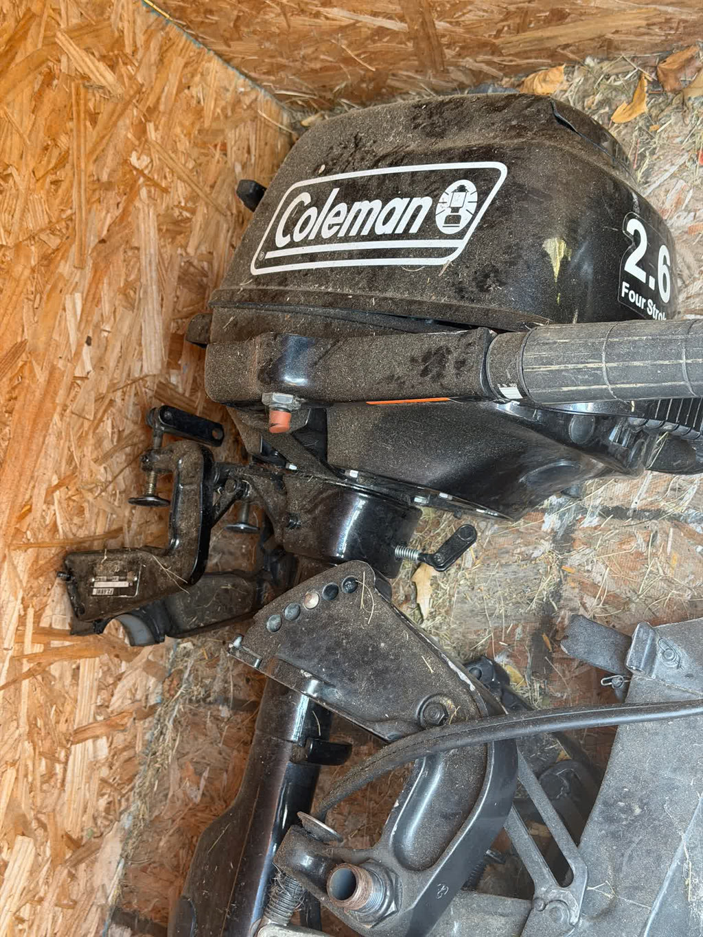 Coleman 2.6 four-stroke outboard cowl, dusty from storage