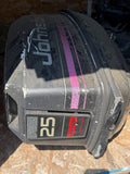 Johnson 25 HP outboard cowl with magenta stripe graphics, showing scuffs and storage dust