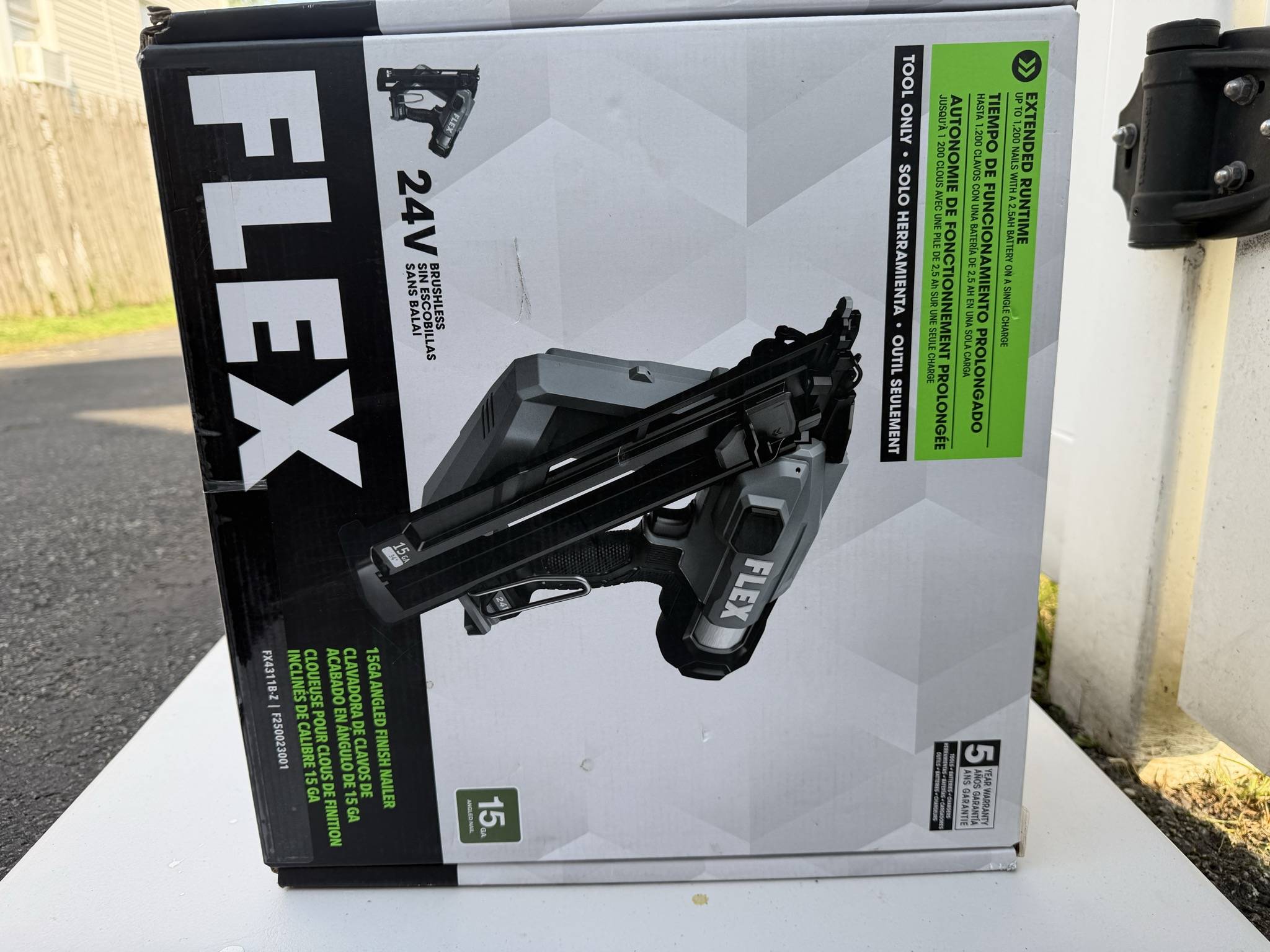 FLEX 24V 15-gauge finish nailer carton front showing scuffs and corner wear