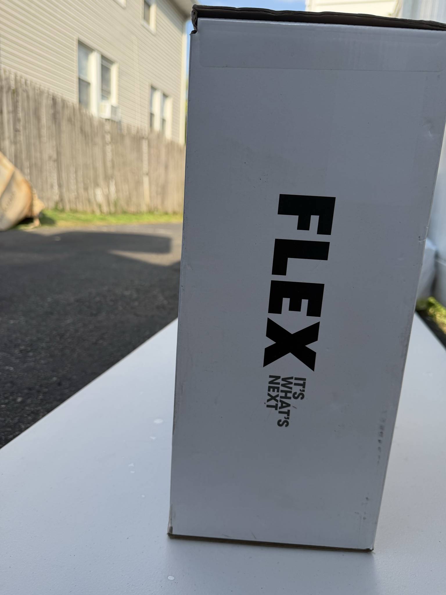 FLEX finish nailer carton side panel with branding and visible edge wear