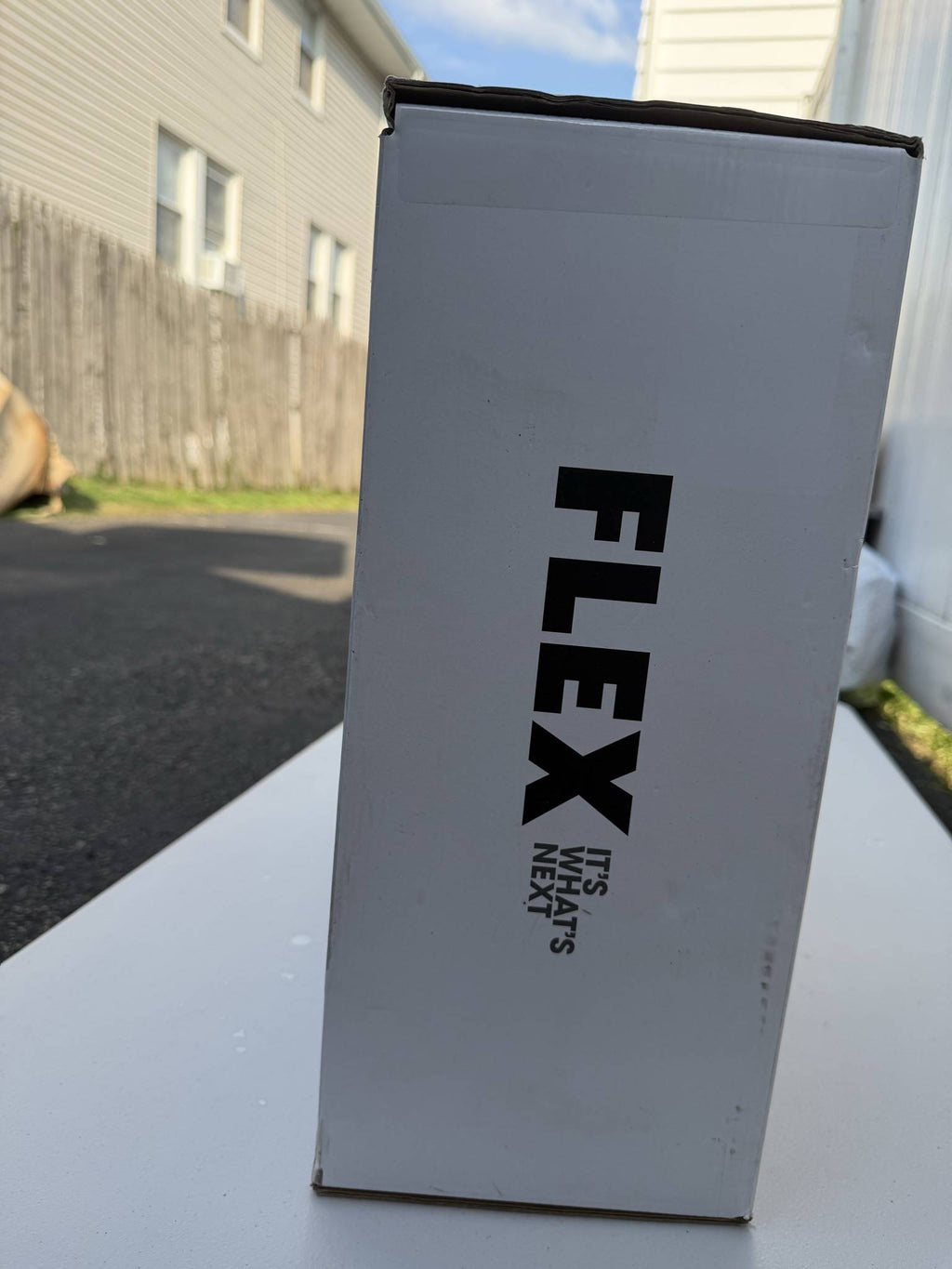 FLEX finish nailer carton opposite side panel showing corner and handling wear