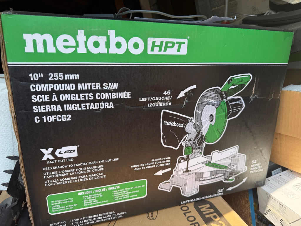 Metabo HPT C10FCG2 10-inch compound miter saw carton showing scuffs, punctures, and edge wear