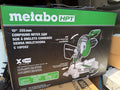 Metabo HPT C10FCG2 10-inch compound miter saw carton showing scuffs, punctures, and edge wear