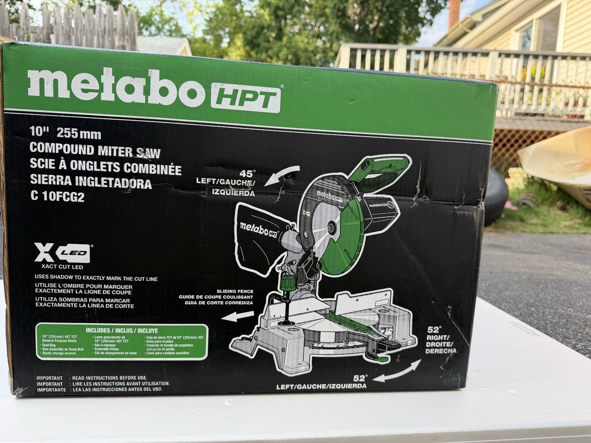 Metabo HPT C10FCG2 carton front close view showing creases and puncture damage