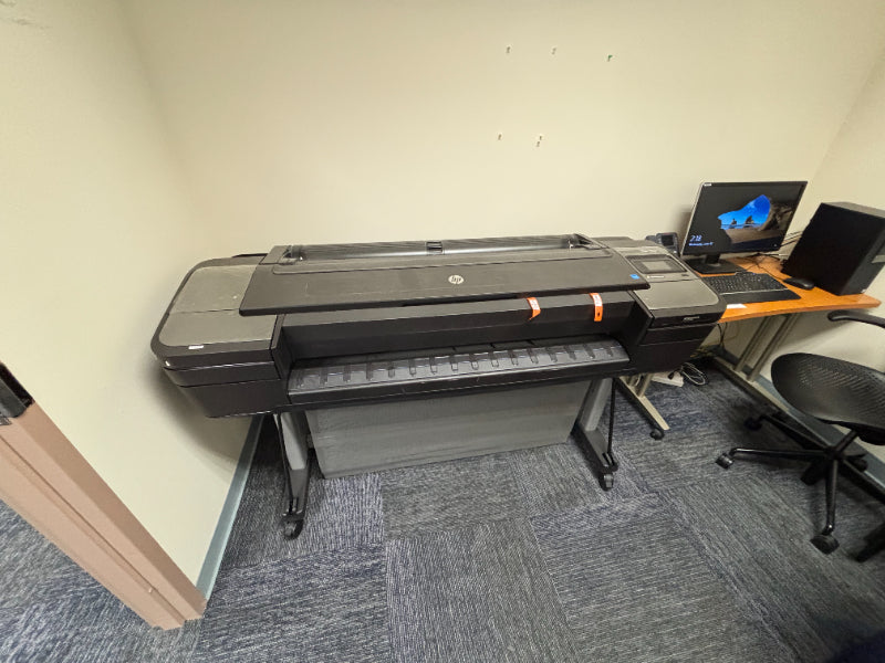 HP DesignJet Z6 44-inch plotter shown full length on its stand, side view
